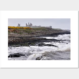 Waves battering the coast near Dustanburgh castle Northumberland, UK Posters and Art